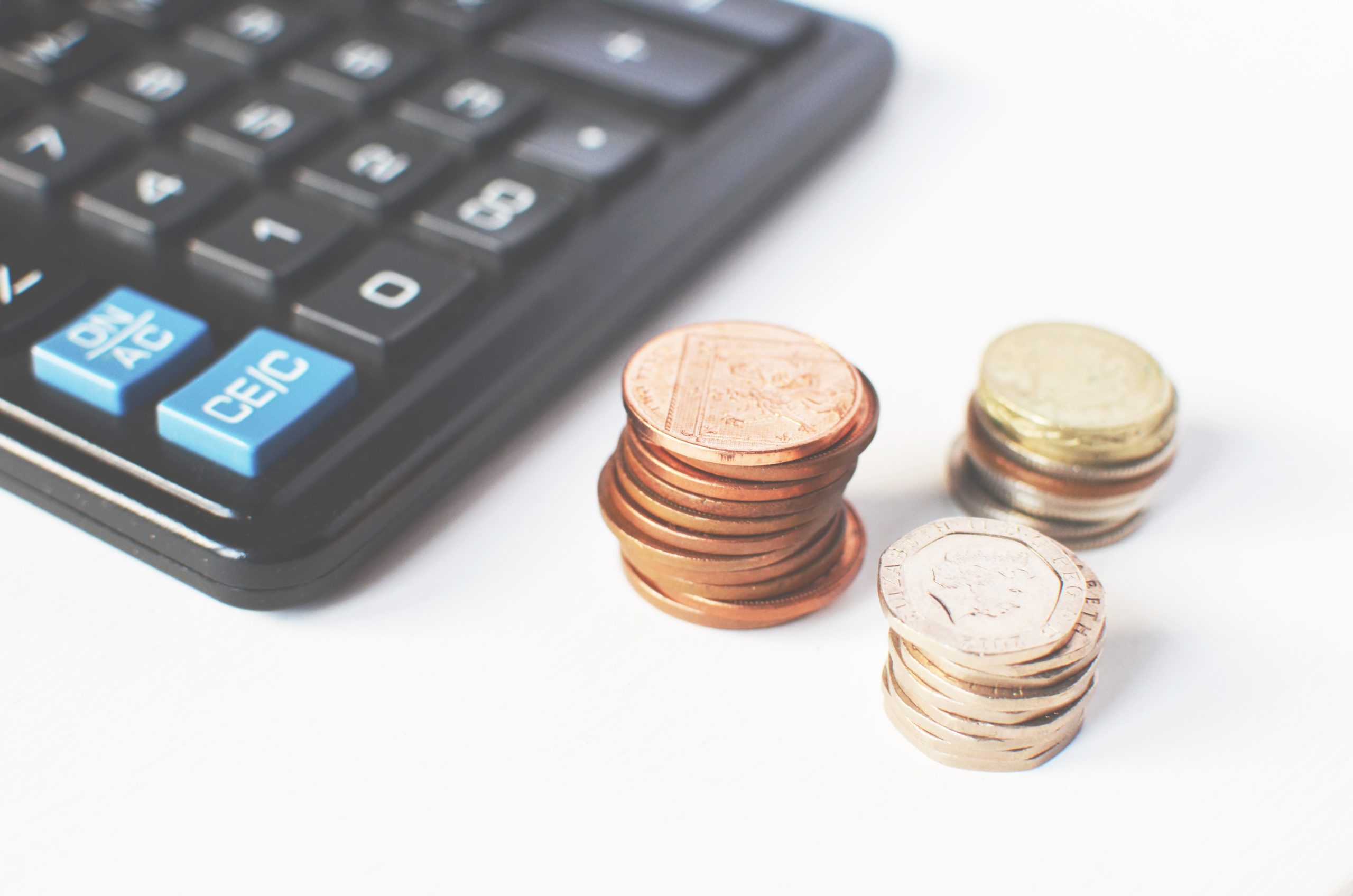 calcualtor on table with money