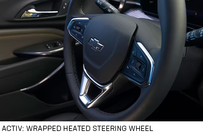 Steering Wheel Close-Up of the 2024 Chevrolet Trax Activ with Text - Barnes Wheaton GM South Surrey
